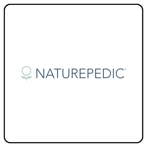 Naturepedic GOTS-certified organic mattress showing the quilted organic cotton surface and layered natural latex interior.