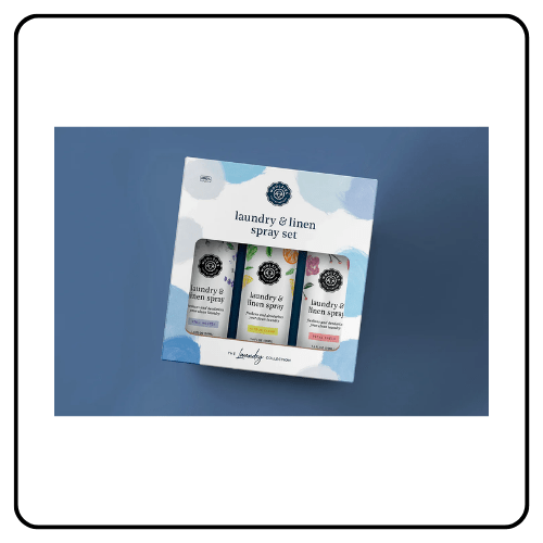 A set of Nest Bedding laundry and linen sprays in glass bottles, designed for refreshing fabrics and bedding with essential oil-based scents.