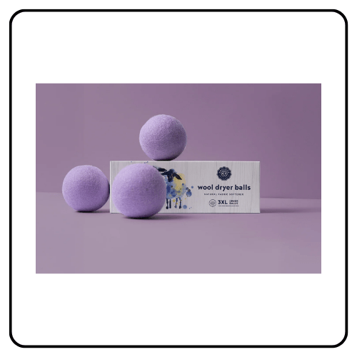 Three large organic wool dryer balls made from premium New Zealand wool, designed to reduce laundry wrinkles and drying time.
