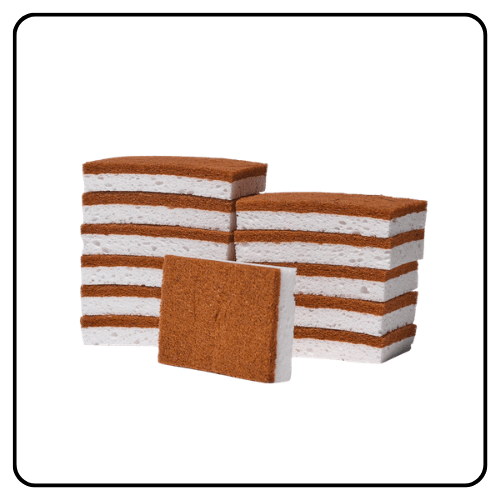 A 12-pack of Public Goods natural scrubber sponges featuring a soft yellow cellulose side and a textured tan coconut-fiber scrubbing surface.