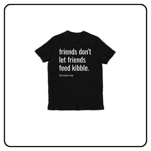 A soft lifestyle t-shirt featuring the text "Friends Don't Let Friends Feed Kibble" in a clean, modern font.