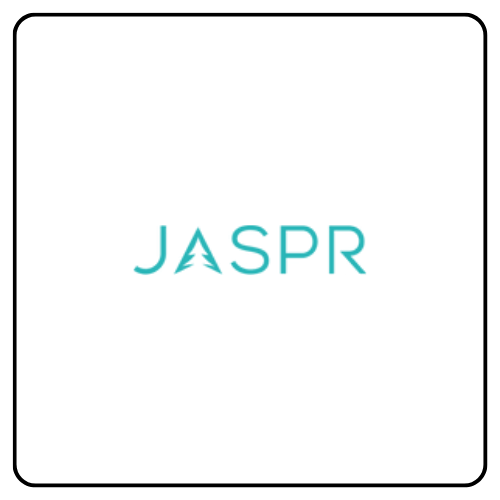 Sleek, cylindrical steel Jaspr Air Scrubber in a modern home setting, showcasing its minimalist design and 360-degree air intake for whole-room purification.