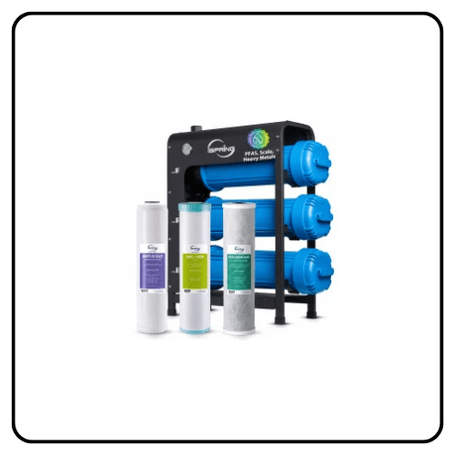 An installed iSpring multi-stage whole house water filtration system connected to a home's main water line to provide clean, filtered water to the entire household.